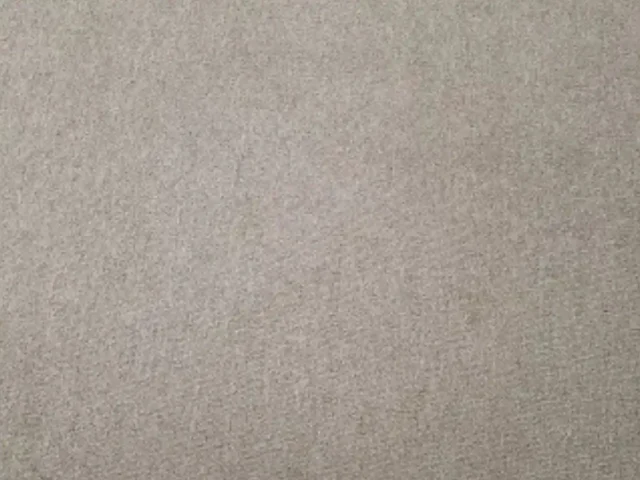 Fitted carpet after visible stains were removed during cleaning